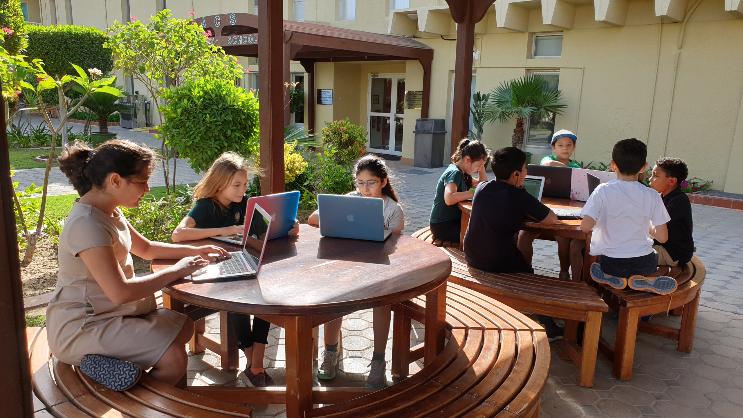 students on laptops