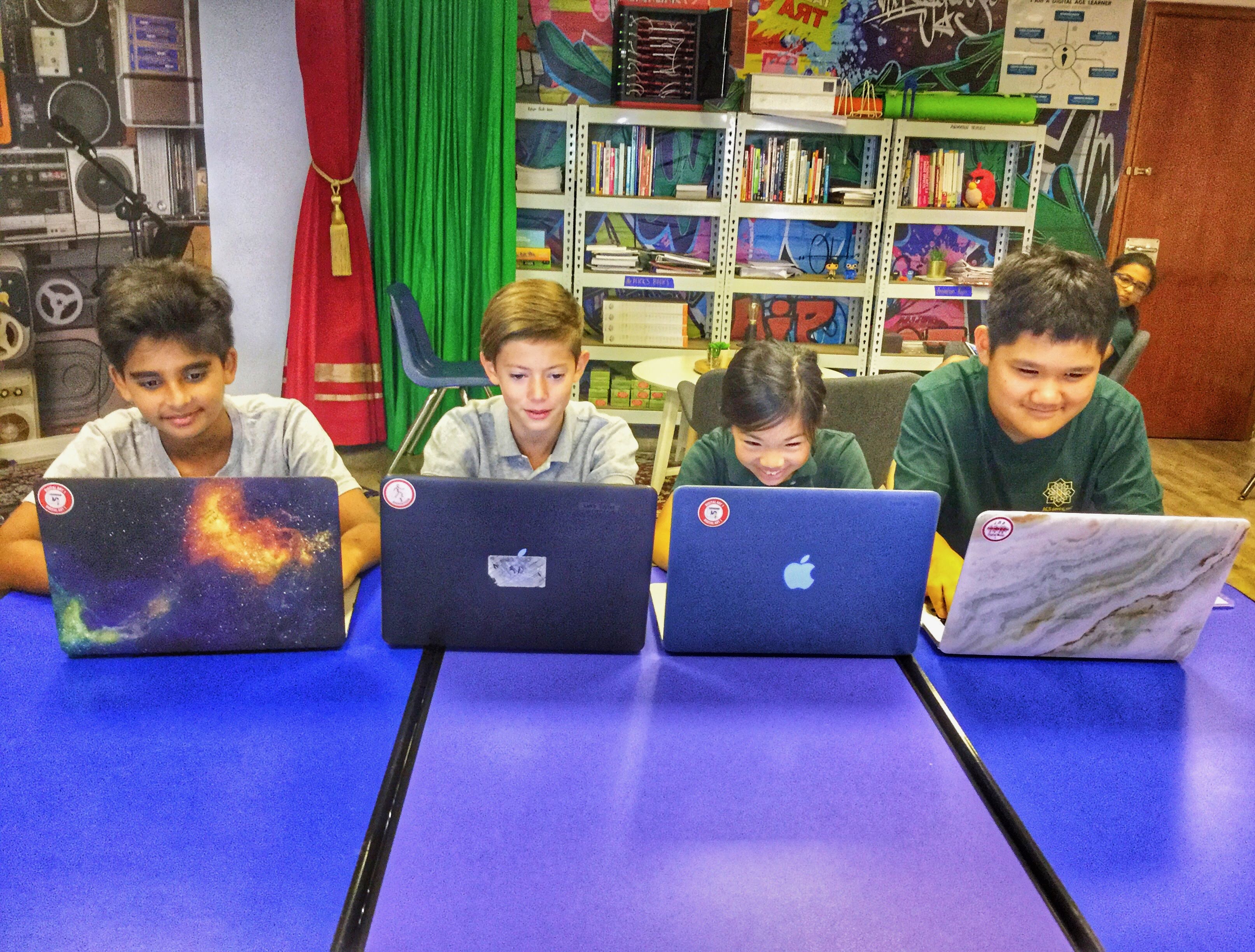Boys on Laptops